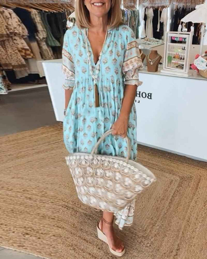 MANA | MIDILANGE CHIQUE FLORALEN JURK MIT V-AUSSCHNITT