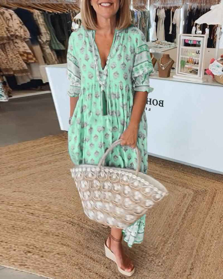 MANA | MIDILANGE CHIC FLORAL JURK MIT V-AUSSCHNITT