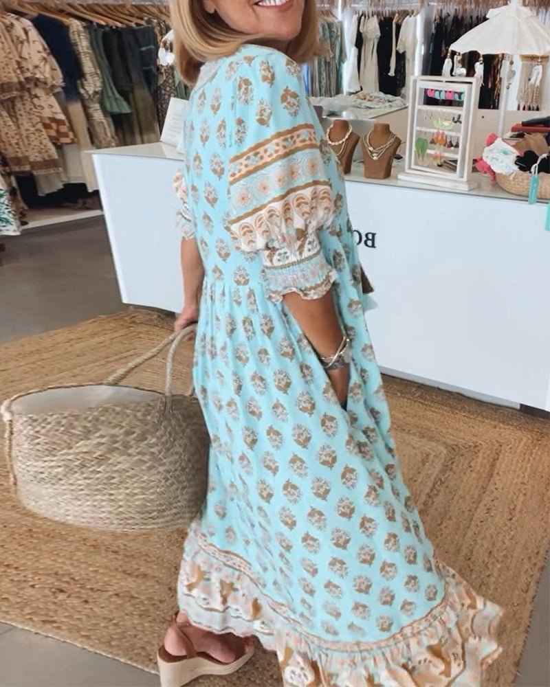 MANA | MIDILANGE CHIQUE FLORALEN JURK MIT V-AUSSCHNITT