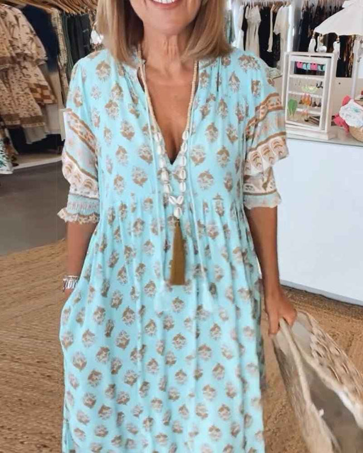 MANA | MIDILANGE CHIQUE FLORALEN JURK MIT V-AUSSCHNITT